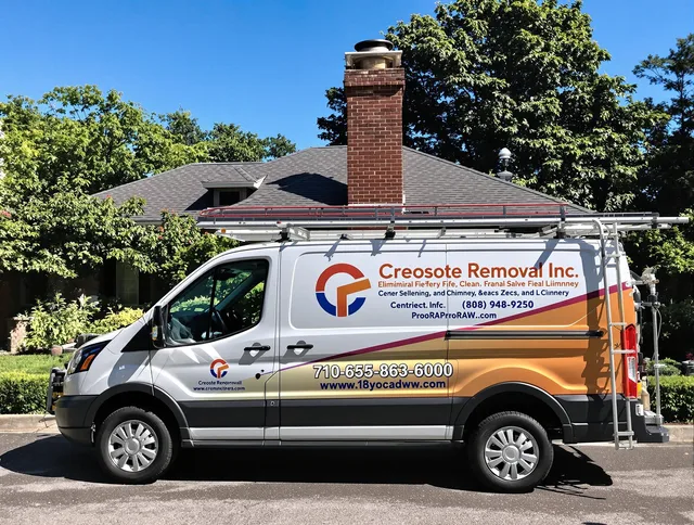 Greenwich Chimney Sweep technician removing creosote safely in Greenwich, CT