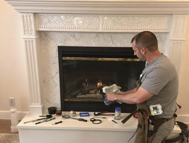 Greenwich Chimney Sweep performing fireplace maintenance in Greenwich, CT